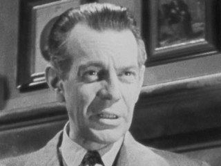 Raymond Massey in The Woman in the Window
